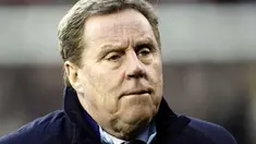 Manager of Tottenham Hotspurs Harry Redknapp awaits kick off against Fulham during a FA Cup fourth round football match at Craven Cottage in London, England, on January 30, 2011. AFP PHOTO/Ian Kington