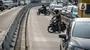 Sementara itu, para personel Korlantas (Korps Lalu Lintas) juga sudah diarahkan ke titik kawasan yang tidak terjangkau ETLE guna mengawasi para pengendara yang bandel. (Liputan6.com/Faizal Fanani)