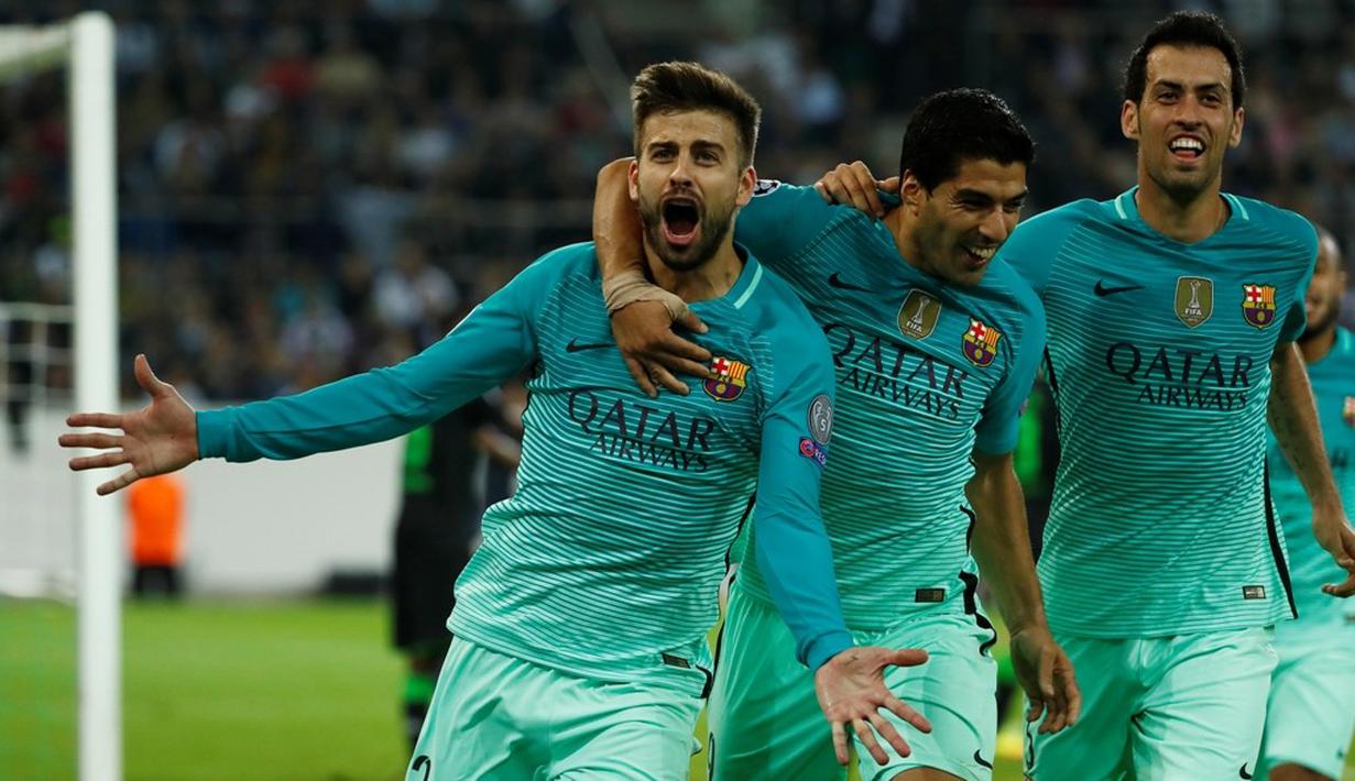 Selebrasi pemain Barcelona setelah Gerard Pique mencetak gol kemenangan ke gawang Borussia Monchengladbach pada laga kedua Grup C Liga Champions di Stadion im Borussia-Park, Kamis (29/9/2016) dini hari WIB. (AFP/Odd Andersen)