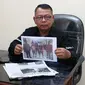 Polisi menunjukkan foto para tersangka penganiayaan pemuda di Kebumen, Jawa Tengah. (Foto: Liputan6.com/Polres Kebumen/Polres Kebumen/Muhamad Ridlo)