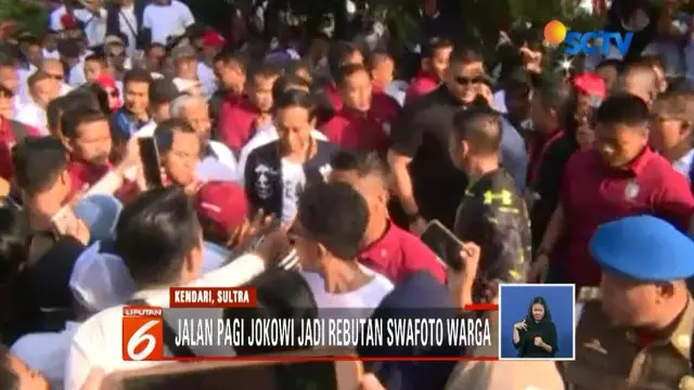 Tangan Jokowi penuh luka cakar saat salami warga di Kendari, Sulawesi Tenggara.