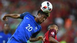 Kingsley Coman menjadi sayap andalan Deschamps di skuat Les Bleus beberapa tahun terakhir. Ia diketahui mengalami masalah pada jantungnya pada pertengahan september lalu dan harus absen untuk memperkuat Timnas Prancis pada laga Semifinal UEFA National League 2021 nanti. (AFP/Patrik Stollarz)