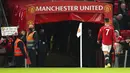 Pemain Manchester United Cristiano Ronaldo menuju ke terowongan setelah peluit akhir melawan Liverpool pada pertandingan Liga Inggris di Old Trafford, Manchester, Inggris, Minggu (24/10/2021). Liverpool menang 5-0. (Martin Rickett/PA via AP)