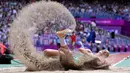 Atlet Uzbekistan, Ekaterina Voronina berkompetisi pada nomor lompat jauh di Asian Games 2022 di Hangzhou, China, 1 Oktober 2023. (AFP/William West)