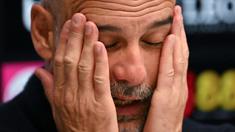 Kekecewaan tak mampu ditutupi pelatih Pep Guardiola setelah gagal membawa Manchester City menjadi juara Liga Inggris 2025/2026. (AFP/Glyn Kirk)