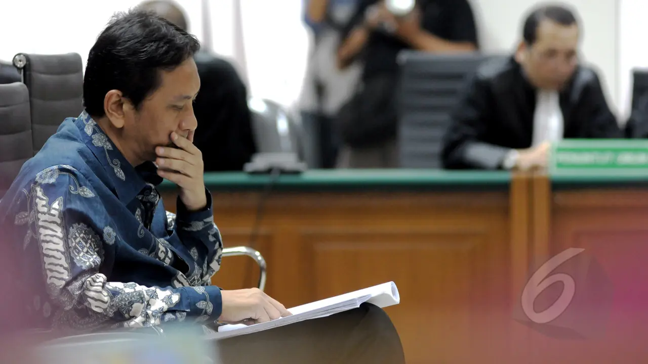 Ekspresi Udar Pristono Saat Jalani Sidang Pembacaan Dakwaan