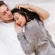 Ilustrasi pasangan suami istri di tempat tidur/copyright freepik.com/lookstudio