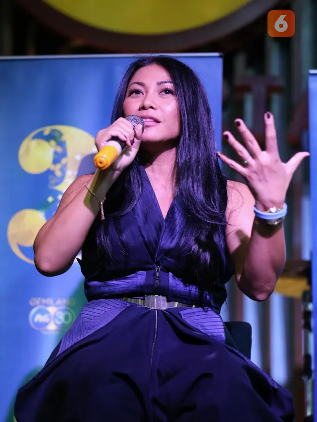 [Fimela] Anggun C Sasmi