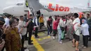 Ratusan WNI korban TPPO ini terdiri atas 313 laki-laki dan 87 perempuan. (Tatan SYUFLANA/POOL/AFP)