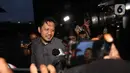 Dia menegaskan tidak terlibat dalam aliran dana yang tengah diselidiki KPK. Tampak dalam foto, Ketua Bidang Ekonomi Pengurus Besar Nahdlatul Ulama (PBNU), Aizzudin Abdurrahman (AIZ) berjalan meninggalkan Gedung Merah Putih Komisi Pemberantasan Korupsi (KPK) usai menjalani pemeriksaan, Jakarta, Selasa (13/1/2026). (Liputan6.com/Helmi Fithriansyah)