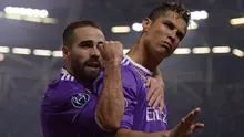 Striker Real Madrid Cristiano Ronaldo (kanan) merayakan gol ke gawang Juventus pada final Liga Champions di Stadion Millenium, Cardiff, Sabtu (3/6/2017). (AFP/Filippo Monteforte)
