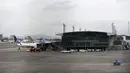 Bandara internasional La Aurora tutup akibat abu vulkanik dari letusan gunung Fuego di Guatemala City, Minggu (3/6). Gunung berapi yang berada sekitar 40 km di barat daya Guatemala City itu memuntahkan asap dan abu hitam ke langit. (AFP/JOHAN ORDONEZ)