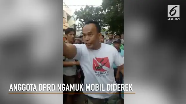 Anggota DPRD DKI Jakarta, Fajar Sidiq, marah saat mobilnya diderek Dishub.