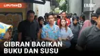 Gibran Rakabuming Raka Bagi-Bagi Buku dan Susu