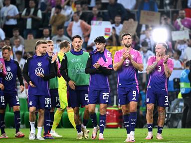 Para pemain Jerman merayakan kemenangan usai pertandingan persahabatan internasional melawan Yunani di Moenchengladbach, Jerman, pada 7 Juni 2024. (Uwe KRAFT/AFP)