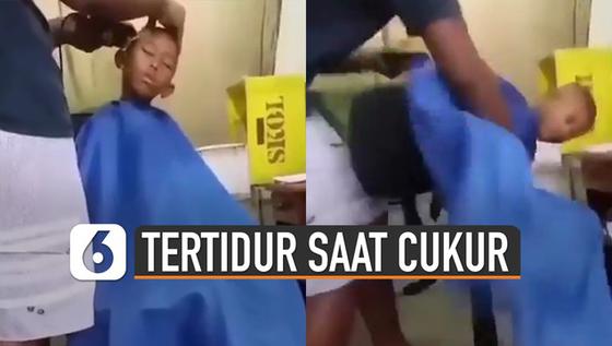 VIDEO: Kocak, Bocah Tertidur Saat Cukur Rambut