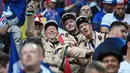 Pendukung Prancis yang berpakaian seperti petugas gendarme menghadiri pertandingan sepak bola Euro 2024 Grup D antara Austria dan Prancis di Duesseldorf Arena, Duesseldorf pada 17 Juni 2024. (OZAN KOSE/AFP)