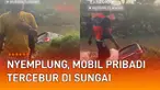 Sebuah mobil pribadi tercebur di sungai mengundang perhatian