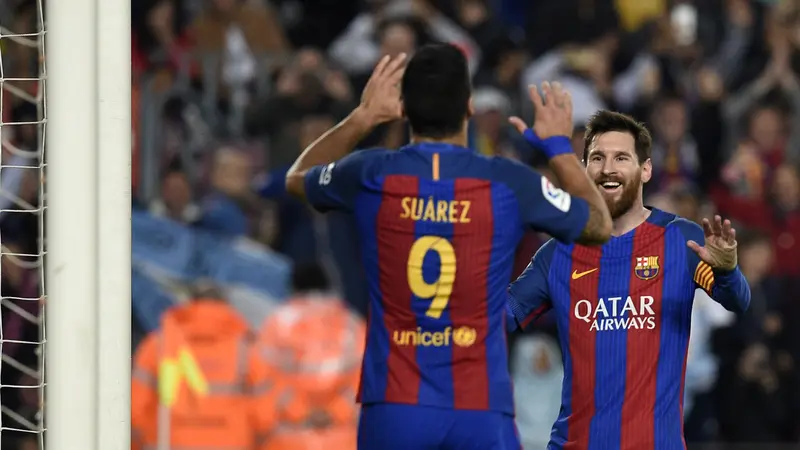 Lionel Messi dan Luis Suarez