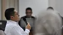 Ekspresi Mantan Ketua Umum DPP Partai Demokrat, Anas Urbaningrum saat menjalani sidang lanjutan di Pengadilan Tipikor, Kamis (4/9/14). (Liputan6.com/Miftahul Hayat) 