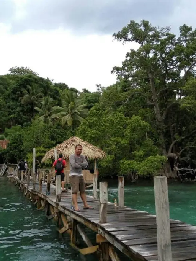 Keindahan alam Pantai Punagaan akan membuat mata melek saat pagi hari. (Liputan6.com/Eka Hakim).