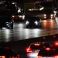 Kendaraan melintasi New York's Grand Central Parkway di New York, Amerika Serikat, 19 Desember 2022. Liburan Natal dan Tahun Baru bagi sebagian warga Amerika Serikat dan Eropa tahun ini menghadirkan kekhawatiran karena tekanan ekonomi. (AP Photo/Frank Franklin II)