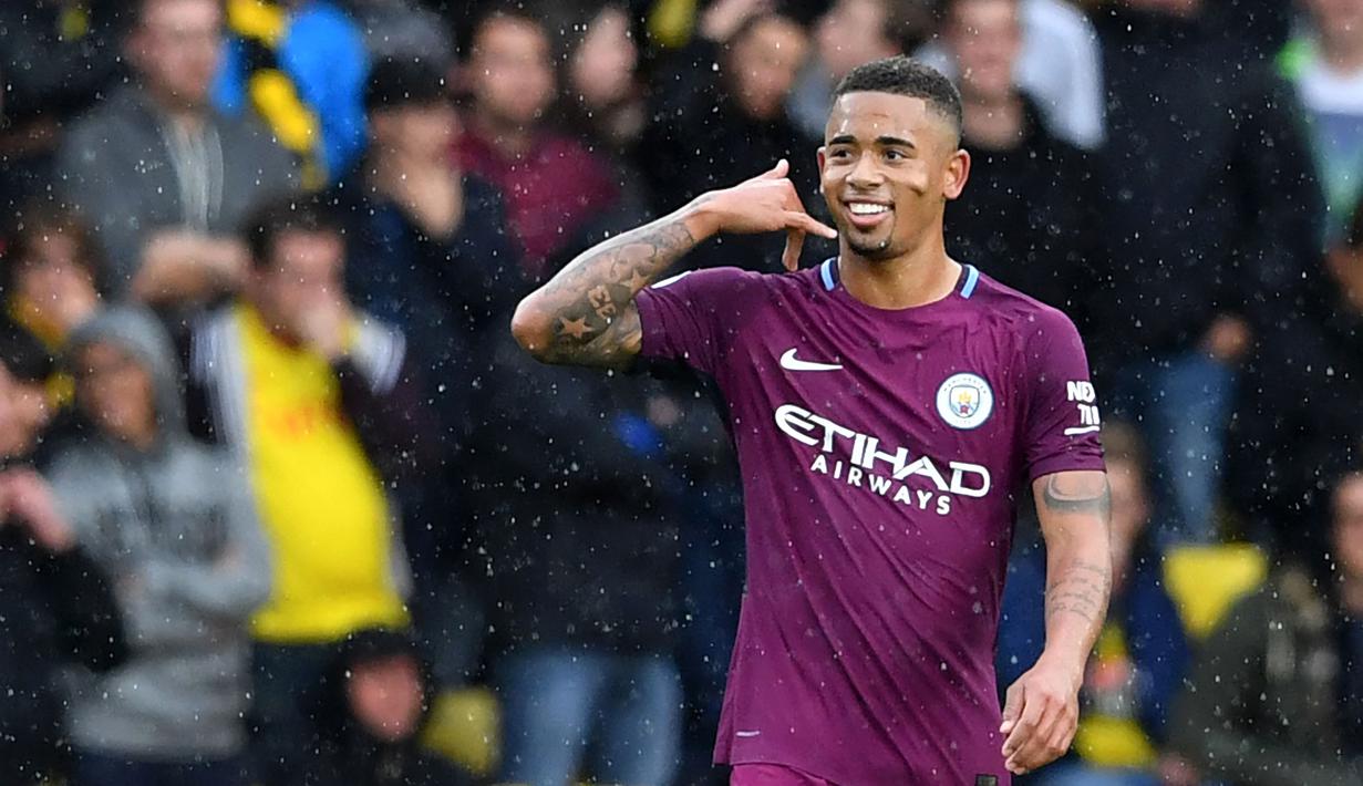 Gaya selebrasi Gabriel Jesus usai mencetak satu gol ke gawangWatford  (AFP/Ben Stansall)