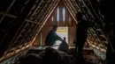 Untuk itu, masyarakat adat Gelar Alam menyerahkan padi ke lumbung adat (leuit) dan memohon berkah untuk tahun berikutnya. (Aditya AJI/AFP)