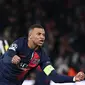 Penyerang Paris Saint-Germain (PSG) #07 Kylian Mbappe merayakn gol yang dicetaknya ke gawang Newcastle United dalam duel matchday 5 Grup F Liga Champions 2023/2024 di Parc des Princes, Rabu (29/11/2023) dini hari WIB. (FRANCK FIFE / AFP)