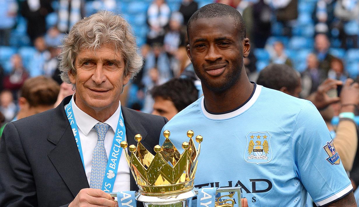 Yaya Toure. Gelandang Pantai Gading yang kini berusia 38 tahun dan telah pensiun pada Januari 2020 bersama QD Huanghai ini pernah memperkuat Manchester City selama 8 musim, 2010/2011 hingga 2017/2018. Tiga kali ia menjadi juara Liga Inggris, musim 2011/12, 2013/14 dan 2017/18. (AFP/Andew Yates)