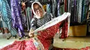 <p>Selain itu, Batik tulis Trenggalek juga pernah tampil pada festival di London dan Paris Fashion Week. (merdeka.com/Arie Basuki)</p>