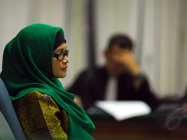 Susi Tur Andayani menjalani sidang putusan di pengadilan Tipikor, Jakarta Selatan,Senin (19/5/14) (Liputan6.com/Miftahul Hayat) 