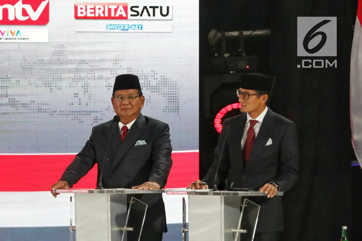 Ekspresi Prabowo - Sandiaga Uno Saat Debat Kelima Pilpres 2019