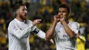 Gelandang Real Madrid, Casemiro, merayakan gol yang dicetaknya ke gawang Las Palmas pada laga La Liga Spanyol di Stadion Gran Canaria, Minggu (13/3/2016). Las Palmas takluk 1-2 dari Real Madrid. (Reuters/Juan Medina)