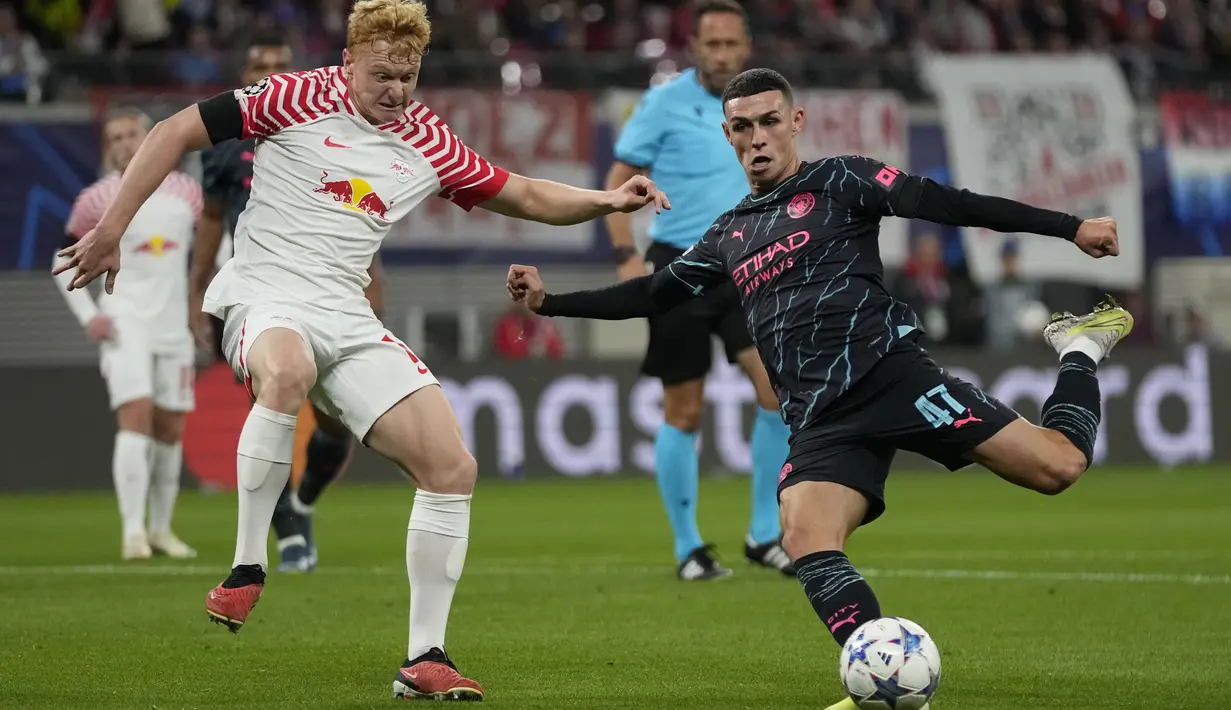 Man City sukses menumbangkan tuan rumah RB Leipzig dengan skor 3-1. (AP Photo/Matthias Schrader)