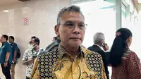 Anggota Komisi III DPR Johan Budi mempertanyakan pengambilan keputusan RUU MK yang digelar saat reses. (Delvira Hutabarat).