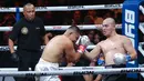 Petarung Indonesia, Ardam Machmud, saat melawan petarung Malaysia, Nidal Mahmoud, pada pertandingan Byon Combat Showbiz Vol. 6 di Tennis Indoor Senayan, Jakarta, Sabtu (22/10/2025). (Bola.com/M Iqbal Ichsan)
