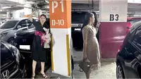 Viral video wanita selalu difoto suami di tempat parkir, alasannya agar tidak lupa. (Sumber: TikTok/hobigalauu)