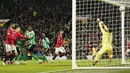 Gelandang Manchester United atau MU, Bruno Fernandes mencetak gol ketiga timnya  ke gawang Real Betis pada leg pertama 16 besar Liga Eropa 2022/2023 di Old Trafford, Jumat dini hari WIB (10/3/2023). Empat gol kemenangan MU dicetak Marcus Rashford, Antony, Bruno Fernandes dan Wout Weghorst. (AP Photo/Dave Thompson)