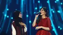 Meski menjadi satu kebanggaan tersendiri karena mendapat kesempatan berduet dengan Fatin dan menyanyikan lagu Iwan Fals, Isyana mengaku sempat takut tidak maksimal dalam bernyanyi. (Deki Prayoga/Bintang.com)