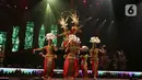 Pertunjukan budaya dalam Pagelaran Sabang-Merauke dikombinasikan dengan musik orkestra serta choir dan ditampilkan dalam panggung megah dan spektakuler. (Liputan6.com/Herman Zakharia)