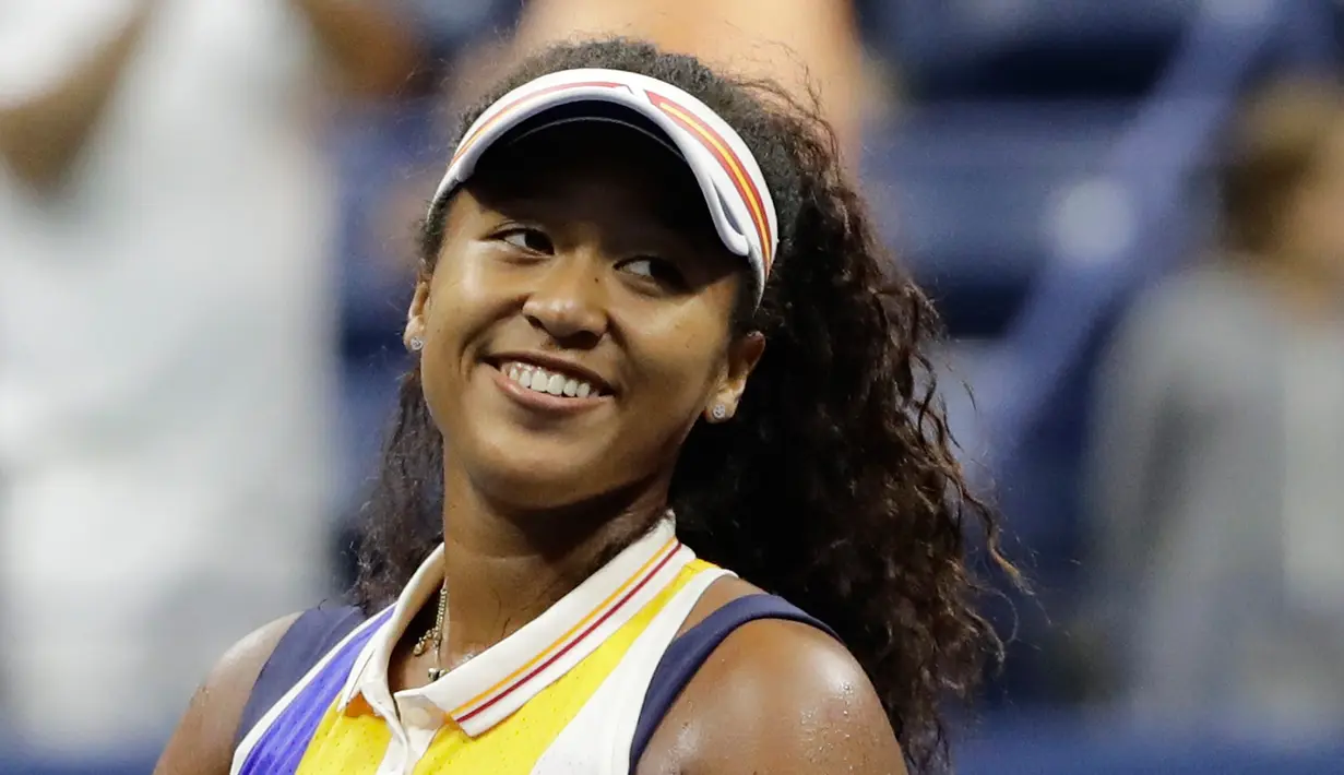 Ekspresi Naomi Osaka usai mengalahkan petenis Jerman, Angelique Kerber dalam putaran pertama AS Terbuka 2017 di New York (29/8). Osaka lahir dari seorang ayah asal Haiti dan ibu asli Jepang. (AP Photo / Frank Franklin II)