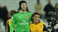 Petr Cech menyangkal kalau Alexis Sanchez tertawakan hasil buruk yang diterima Arsenal. (Sky Sports)
