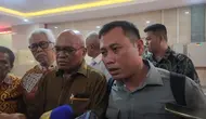 Kusnadi, staf dari Sekjen PDIP Hasto Kristiyanto mendatangi Gedung Bareskrim Polri, Jakarta untuk melaporkan tindakan penyitaan dari penyidik KPK, Kamis (13/6/2024). (Merdeka.com/ Bachtiarudin Alam)