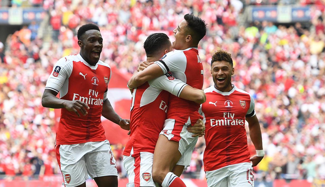 Resminya Alexis Sanchez berlabuh ke Old Trafford ini sekaligus memastikan kepindahan Henrikh Mkhitaryan ke Arsenal. (EPA/Facundo Arrizabalaga)