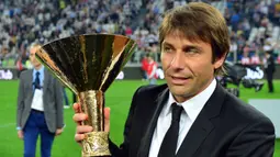 Pada tahun 2011, Juventus akhirnya merekrut Conte setelah melihat kesuksesan bersama Siena. Sempat diragukan karena pengalamannya, Conte berhasil membuktikan dengan menyabet gelar Scudetto pada musim itu. Ia juga mampu membawa Juve mendominasi Serie A tiga musim berturut-turut. (AFP/Giuseppe Cacace)