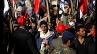 Pendukung pemberontak Houthi di Yaman berdemonstrasi untuk menandai tiga tahun perang di negara itu, di ibukota Sanaa. (Foto: AFP)