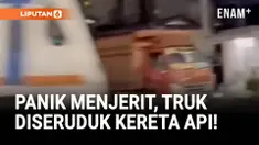 Sebuah truk yang tengah mogok terserempet Commuterline di pintu perlintasan jalur rel kereta api kawasan Green Garden, Kedoya Utara, Kebun Jeruk, Jakarta Barat, Minggu malam. Peristiwa tersebut terjadi setelah truk bak terbuka itu berada tepat di ten...