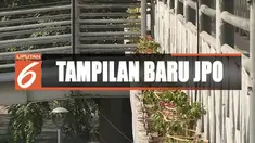 Penanaman baru dilaksakan Sabtu kemarin, namun tampilan berbeda di JPO sudah dirasakan oleh warga yang melintasi jembatan ini.