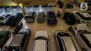 Suasana penjualan mobil bekas di sebuah pusat perbelanjaan di Jakarta, Jumat (26/3/2021). Perusahaan pembiayaan belum tentu memberikan kredit kepada mereka yang hendak memanfaatkan pajak nol persen untuk membeli mobil baru dengan mudah di tengah naiknya risiko kredit macet (Liputan6.com/Johan Tallo)